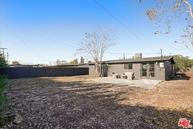 rear view of house with a patio area