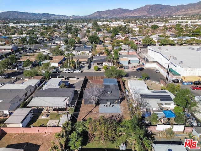 drone / aerial view featuring a mountain view