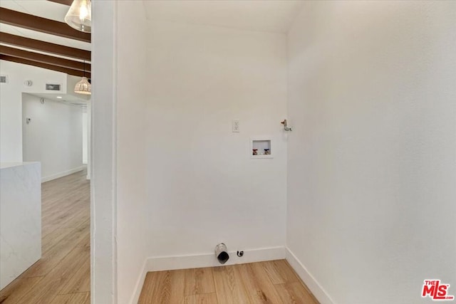 laundry area with washer hookup and hardwood / wood-style flooring