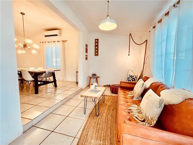 living area with light tile patterned floors, a chandelier, and a wall mounted air conditioner