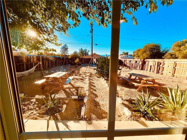 view of yard with a fenced backyard