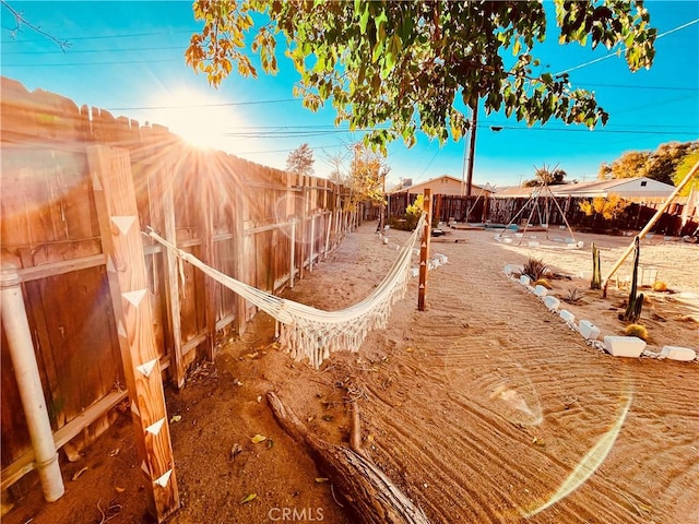 view of yard with a fenced backyard