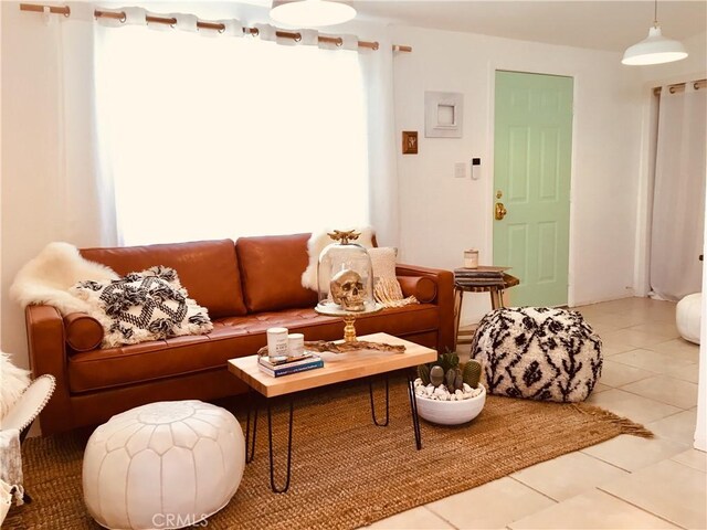 living area with tile patterned flooring