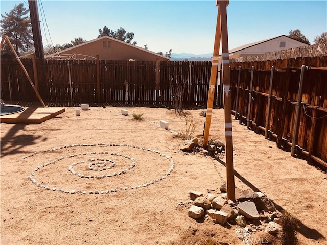 view of yard featuring a fenced backyard