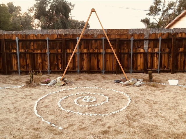 view of yard with fence