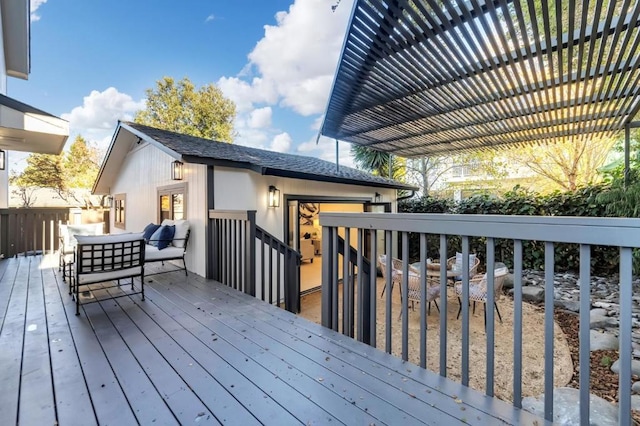 deck with an outdoor hangout area