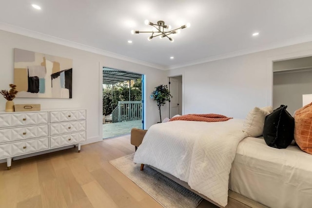 bedroom featuring crown molding, access to exterior, a chandelier, and light wood-type flooring