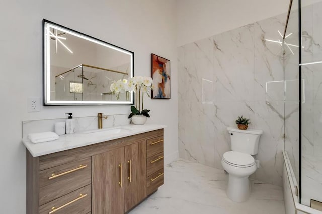 bathroom featuring vanity, toilet, and an enclosed shower