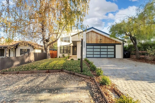 view of front of property with a garage