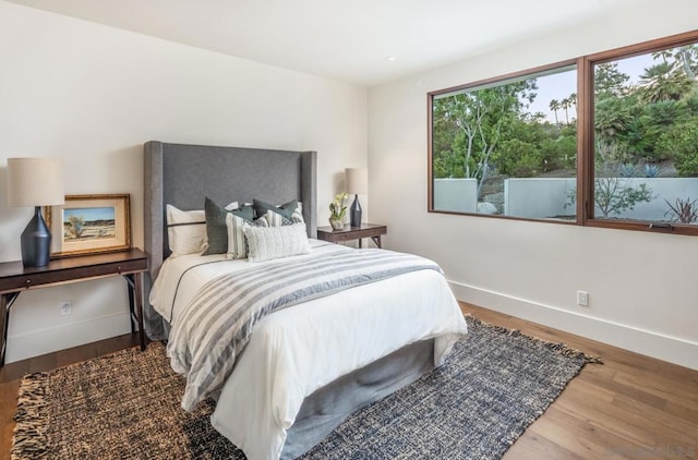 bedroom featuring hardwood / wood-style flooring