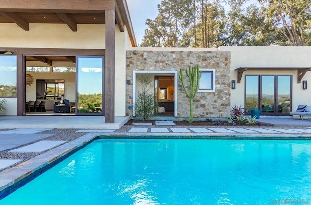 view of pool with a patio