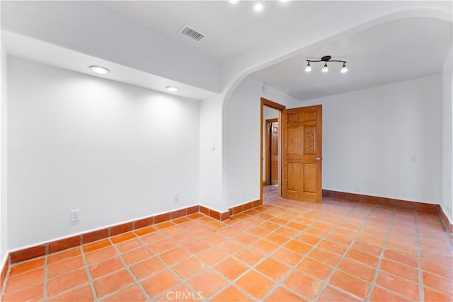 view of tiled spare room