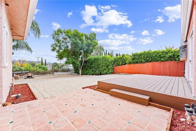 view of patio featuring a wooden deck