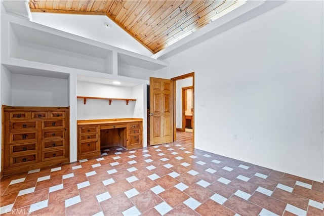 11431 Clybourn Ave, Lakeview Terrace, CA 91342 - unfurnished living room featuring wood ceiling, built in desk, and high vaulted ceiling