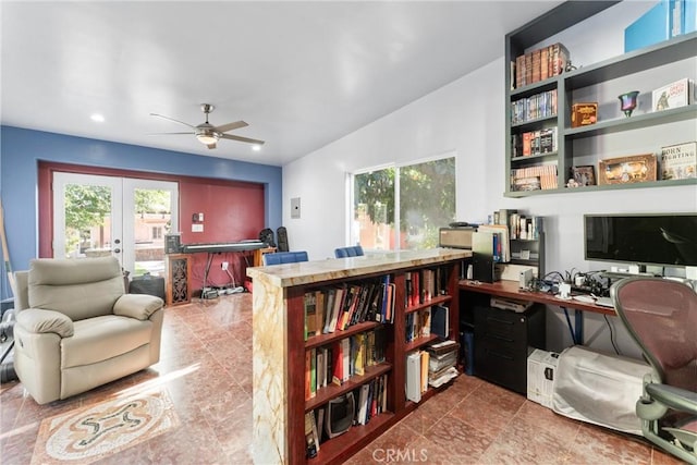 office with a wealth of natural light, french doors, ceiling fan, and vaulted ceiling