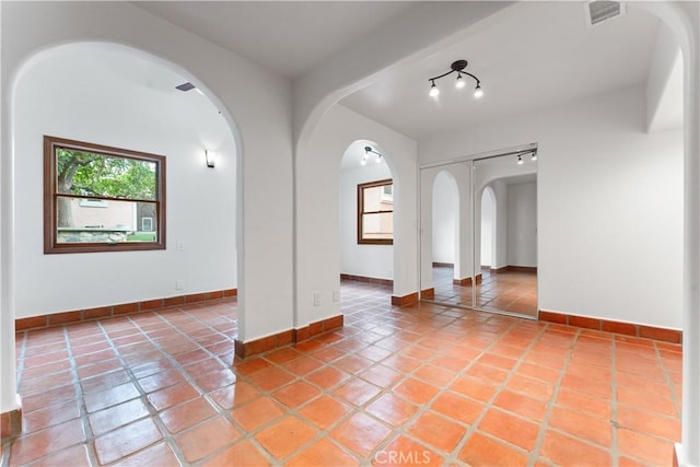 view of tiled spare room