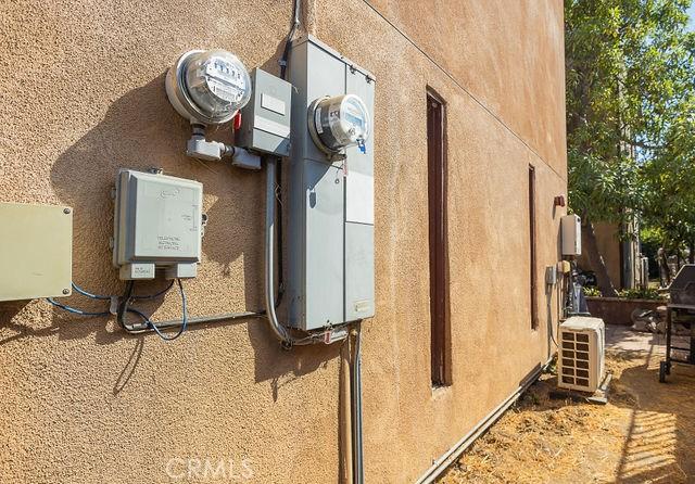 utility room featuring ac unit