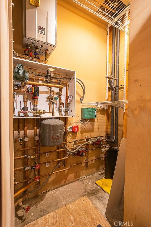 interior space featuring tankless water heater