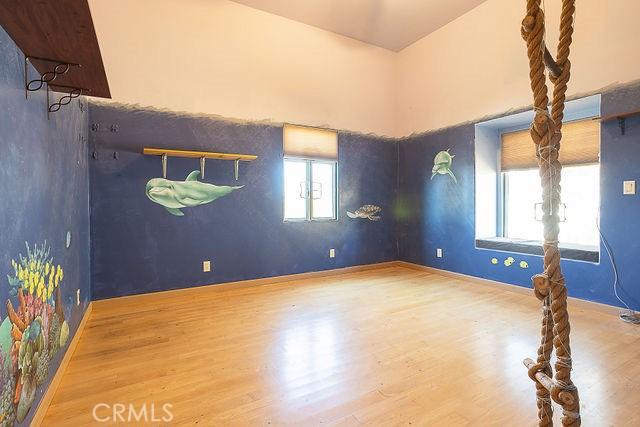 spare room featuring hardwood / wood-style flooring