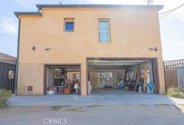 garage featuring fence