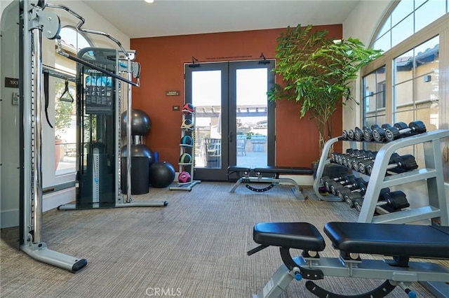 gym with carpet flooring and french doors