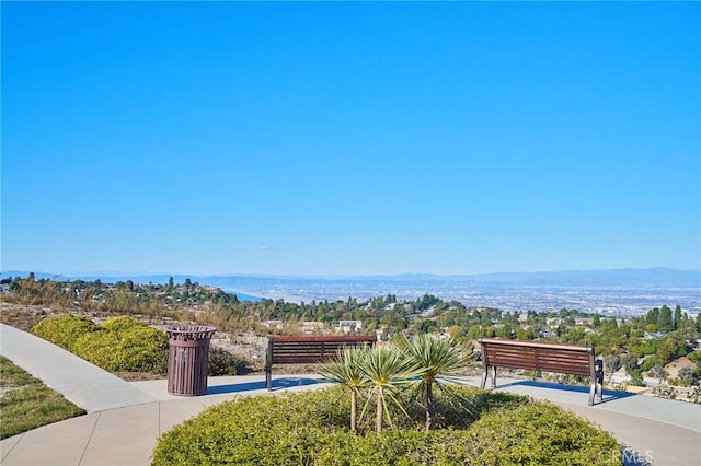 surrounding community featuring a mountain view