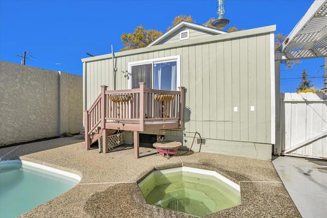 rear view of property featuring a patio