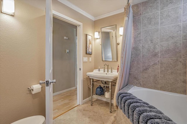 bathroom with shower / tub combo, tile patterned flooring, ornamental molding, and toilet