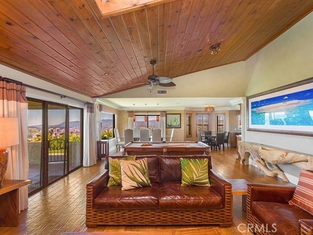 44665 La Cruz Dr, Temecula, CA 92590 - living area featuring lofted ceiling, wood-type flooring, a ceiling fan, and wooden ceiling