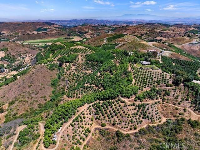 44665 La Cruz Dr, Temecula, CA 92590 - aerial view of property and surrounding area featuring rural landscape and a mountainous background