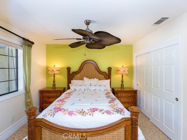 44665 La Cruz Dr, Temecula, CA 92590 - bedroom with a closet and ceiling fan
