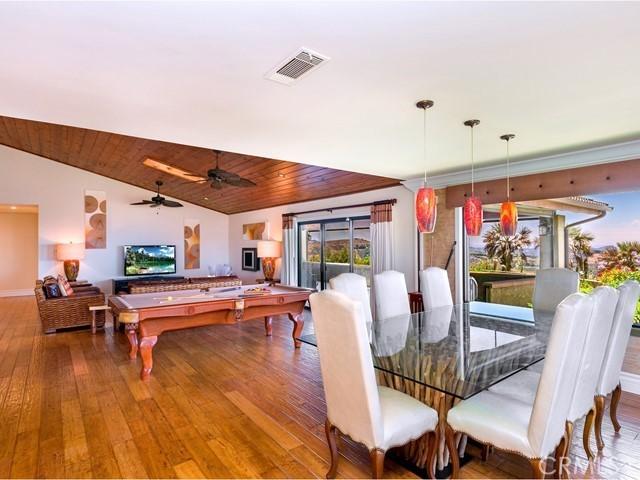 dining space with ceiling fan, wood-type flooring, wooden ceiling, lofted ceiling, and pool table