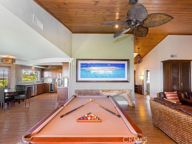 playroom featuring hardwood / wood-style floors, ceiling fan, wooden ceiling, and billiards