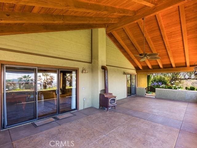 view of patio featuring ceiling fan