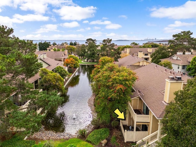 drone / aerial view featuring a water view