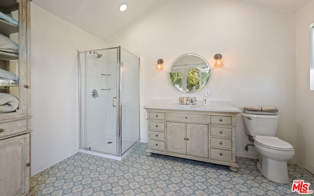 bathroom with toilet, vanity, lofted ceiling, and walk in shower