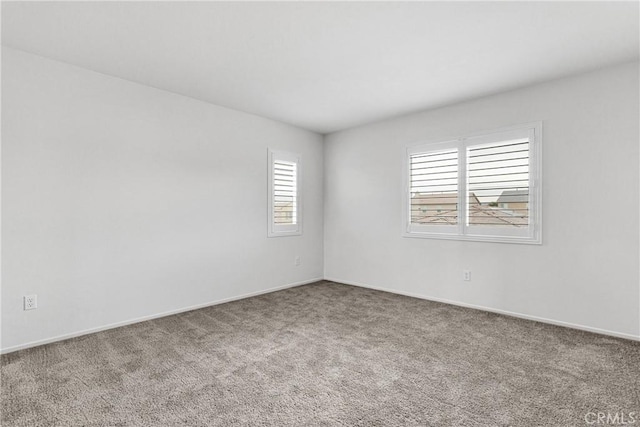 view of carpeted spare room