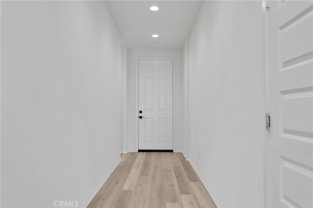 hallway featuring light hardwood / wood-style flooring