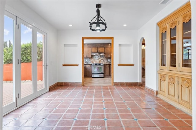 interior space with light tile patterned floors