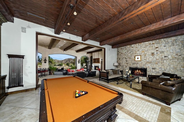 game room featuring a fireplace, beam ceiling, billiards, and wood ceiling