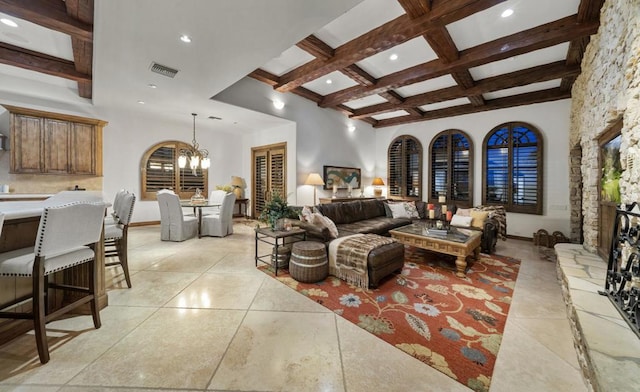 living room featuring a towering ceiling, coffered ceiling, beam ceiling, light tile patterned floors, and an inviting chandelier