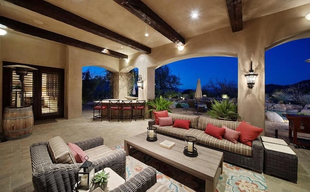 patio at night with an outdoor living space