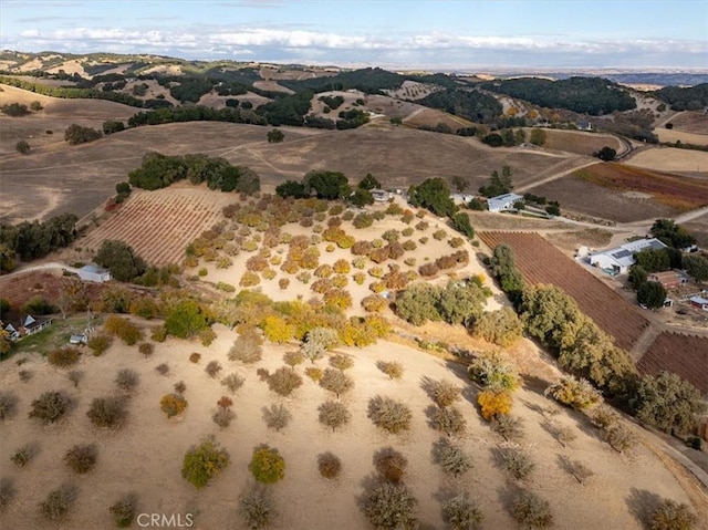 birds eye view of property featuring a rural view