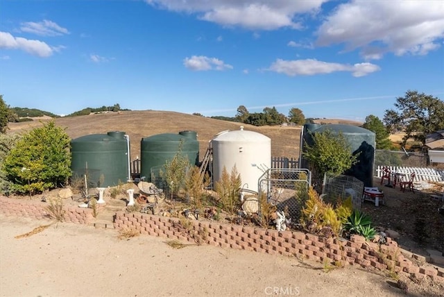 view of property exterior with a mountain view