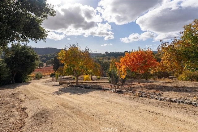 exterior space with a mountain view and a rural view