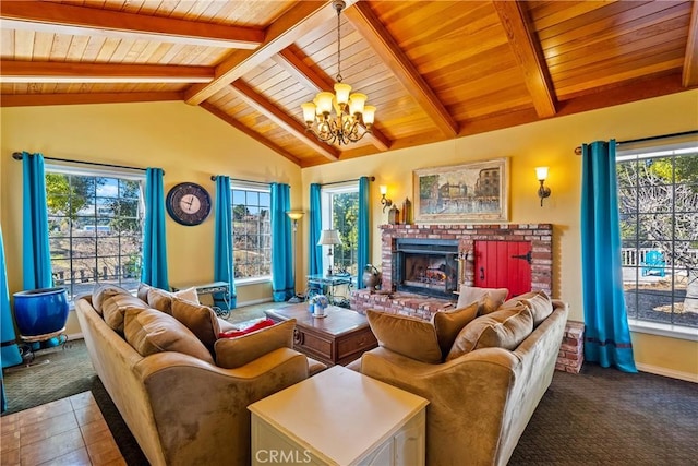 carpeted living room featuring a brick fireplace, a wealth of natural light, and lofted ceiling with beams