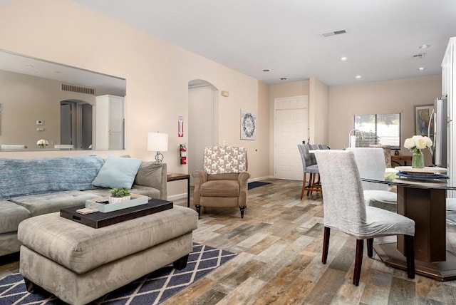 living room with light hardwood / wood-style floors