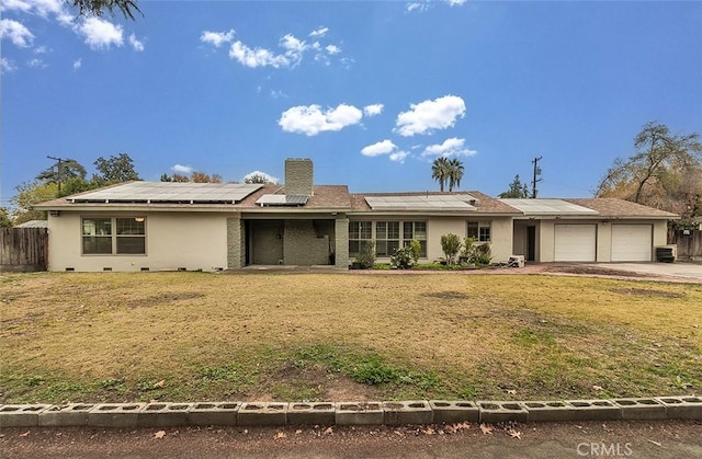 single story home featuring a garage