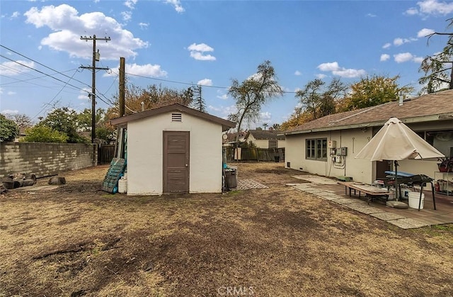 exterior space with a storage unit