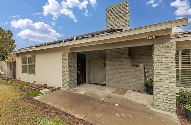 rear view of house featuring a patio